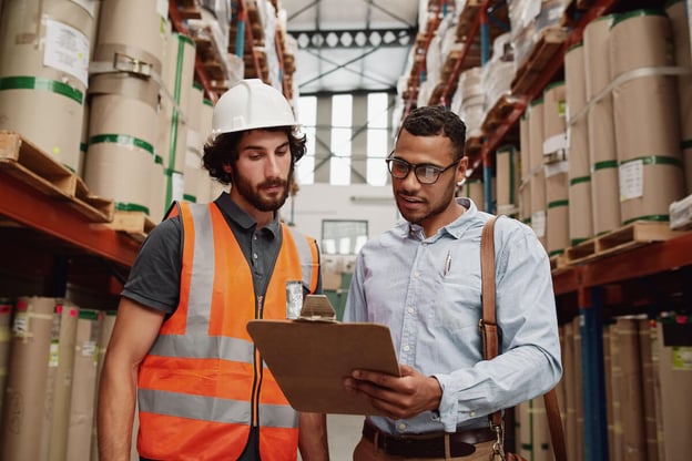 Manager explaining something to a worker
