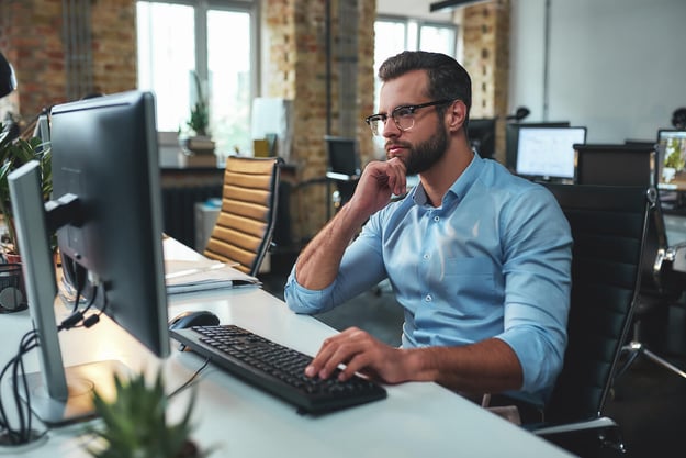 Manager working on document automation