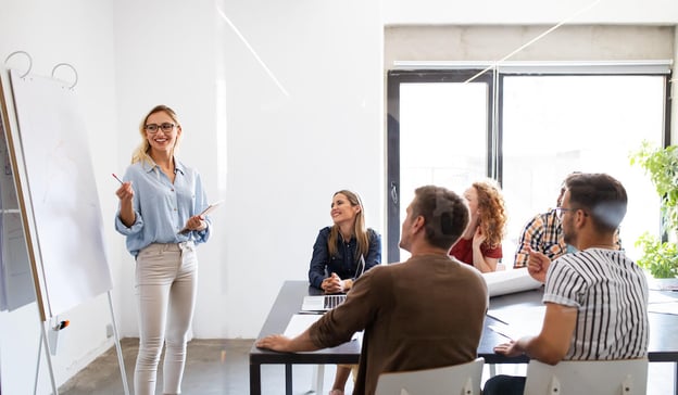 Work stream: entrepreneur presenting to her team
