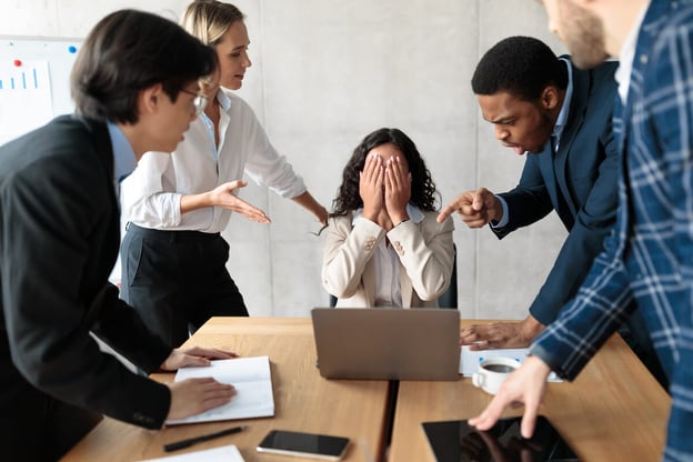 Various employees berating one person
