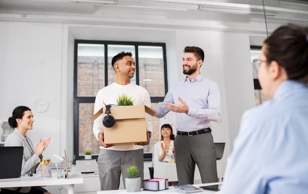 Employee onboarding process: employees saying goodbye to an employee that's leaving