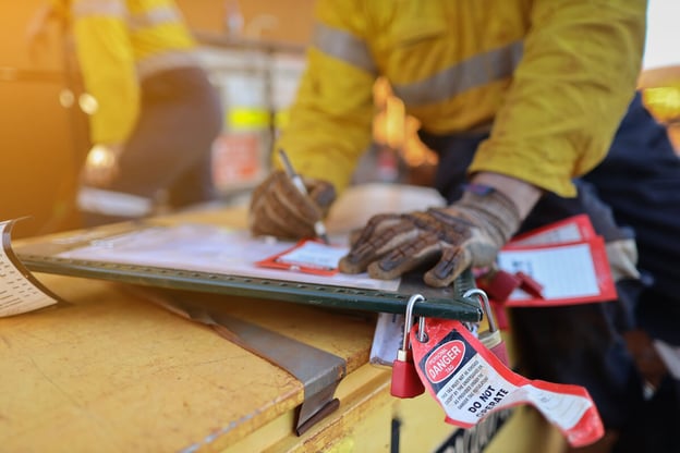 Inspector marking DANGER tags