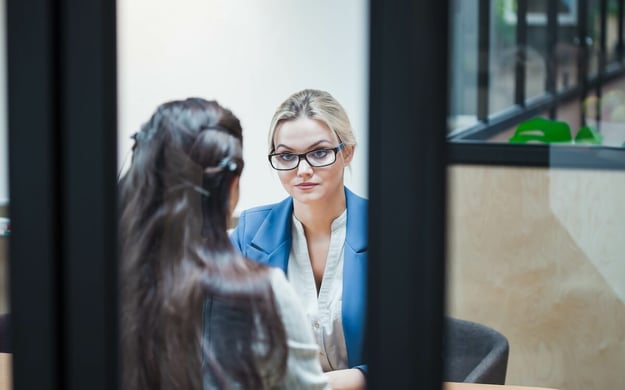 HR manager talking to an employee about FMLA abuse