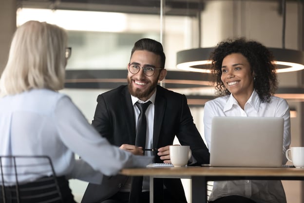 HR managers talking to an employee