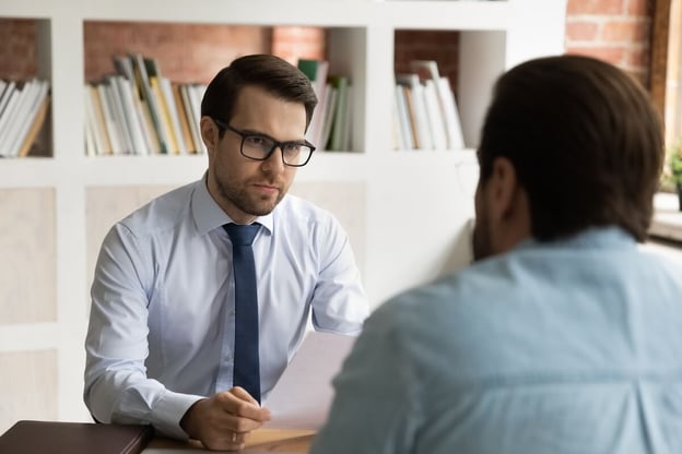 Manager talking to an employee