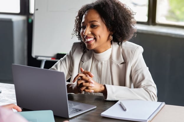 Entrepreneur smiling at an employee