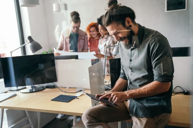 AI workflow automation: employee using a tablet
