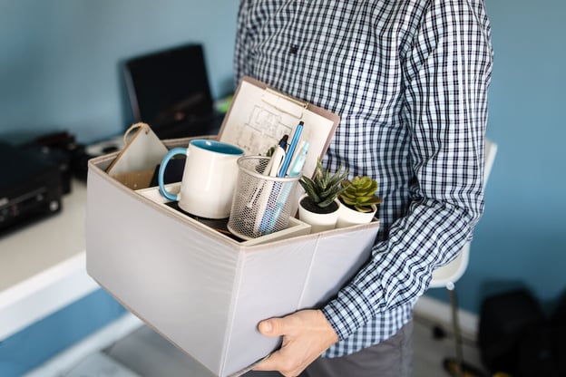 FMLA Colorado: employee carrying a box of his stuff
