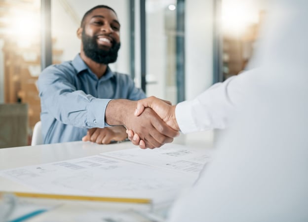 Two people shaking hands