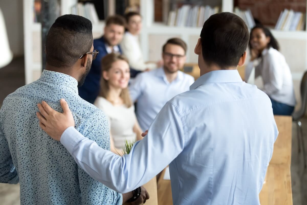Manager introducing a new employee to their team