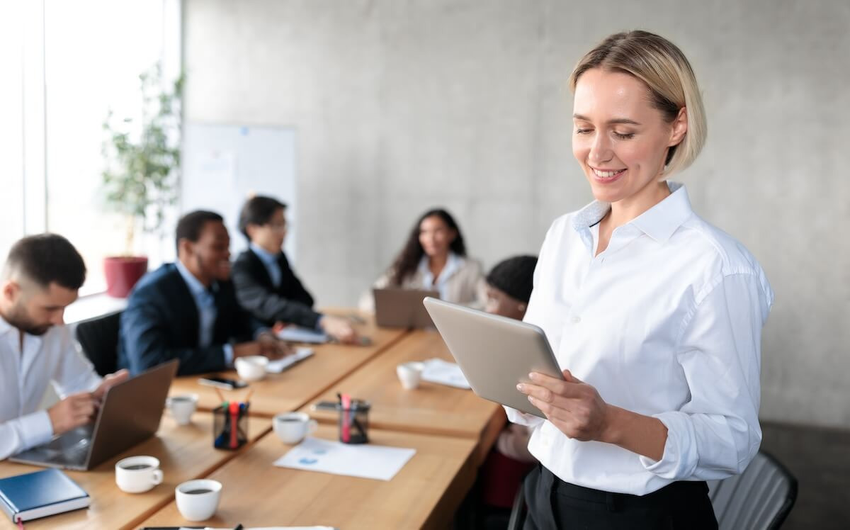 HR technology ROI: manager using her tablet
