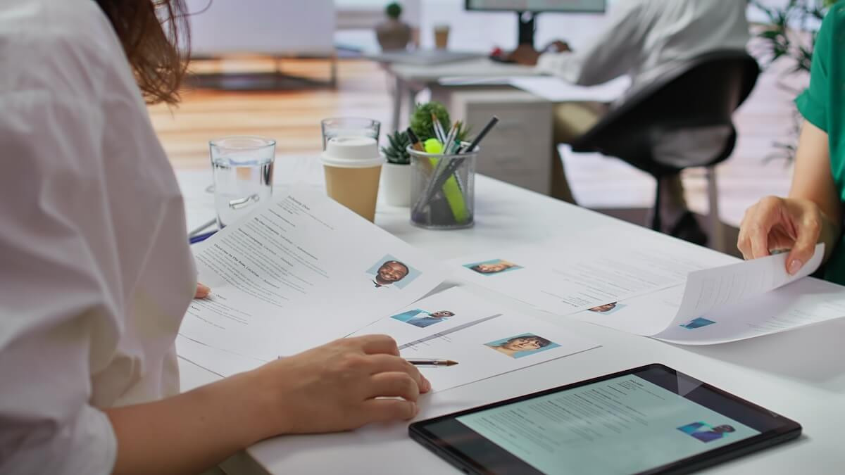 HR process standardization: HR team reviewing resumes