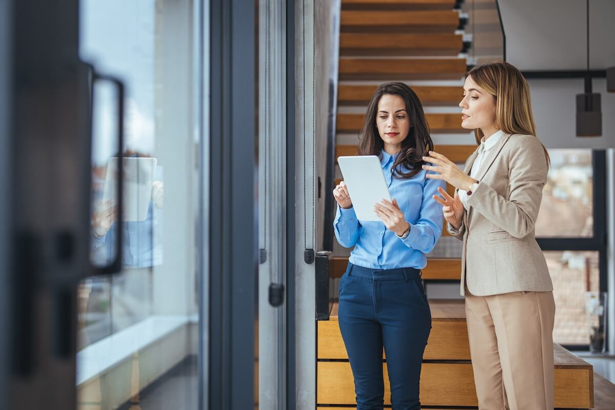 Entrepreneurs looking at a tablet