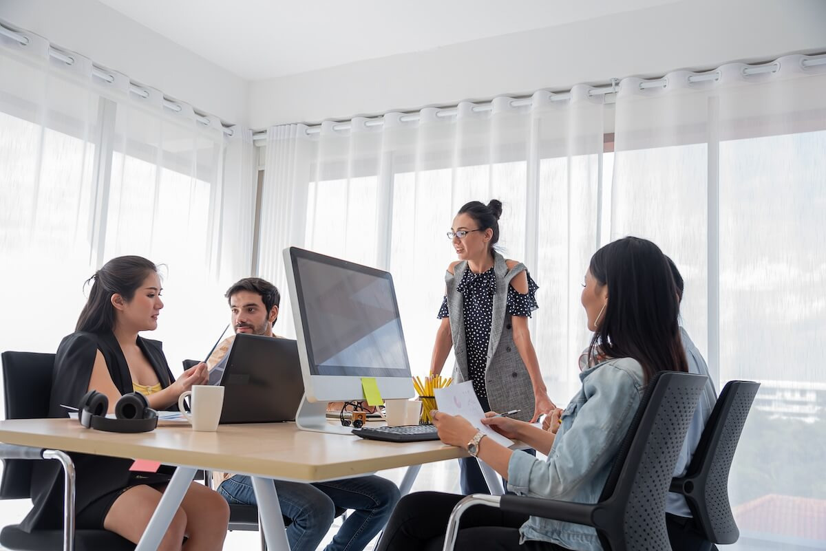 Management and employee relationship: HR tech support team having a meeting