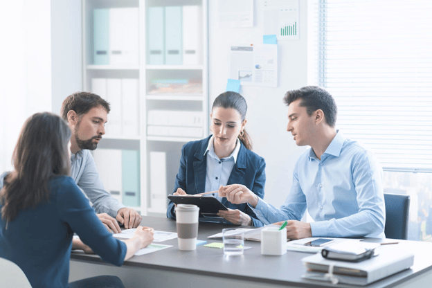 Employees discussing something