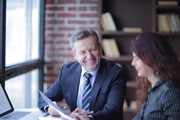 Return to work program: 2 people happily working together