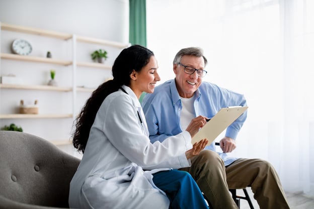 Return to work policy: doctor showing a document to her patient