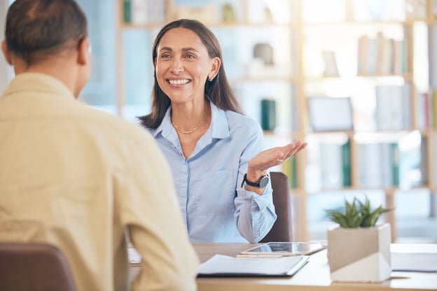 Case management tools: manager talking to her employee
