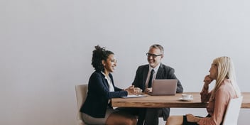 Outsourcing HR functions: executives having a meeting