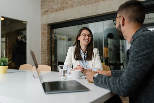 Leave management system: Managers happily talking to each other