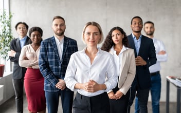 FMLA eligibility checklist: team posing for a photo