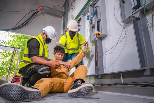 Incident report: two people assisting a co-worker that collapsed