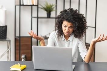 Stressed employee trying to fill-out FMLA forms