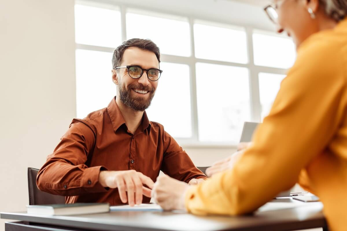 HR staff talking to a colleague