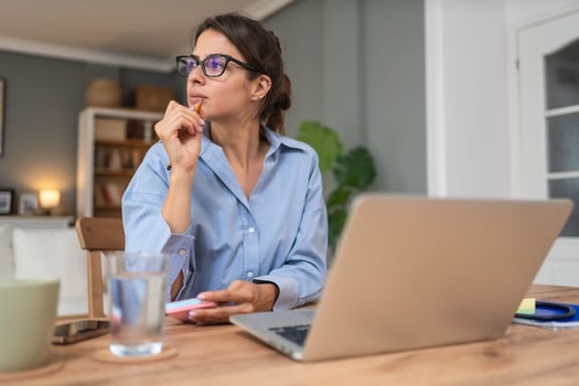 NYC ESSTA: entrepreneur wearing a pair of eyeglasses holding a pencil