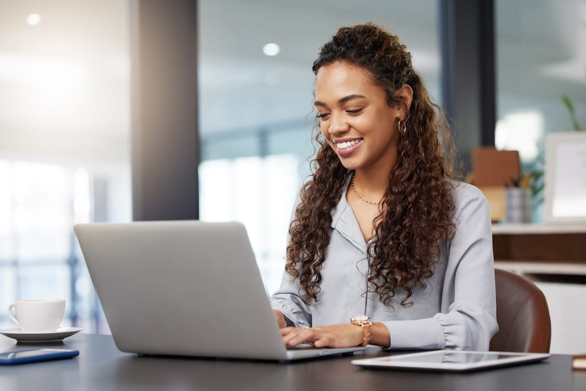 Manager using a laptop