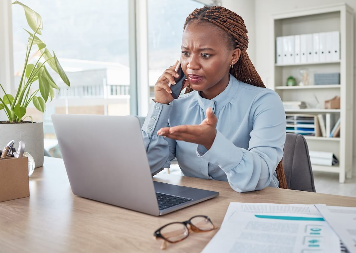 Policy violation documentation: frustrated HR manager talking on the phone